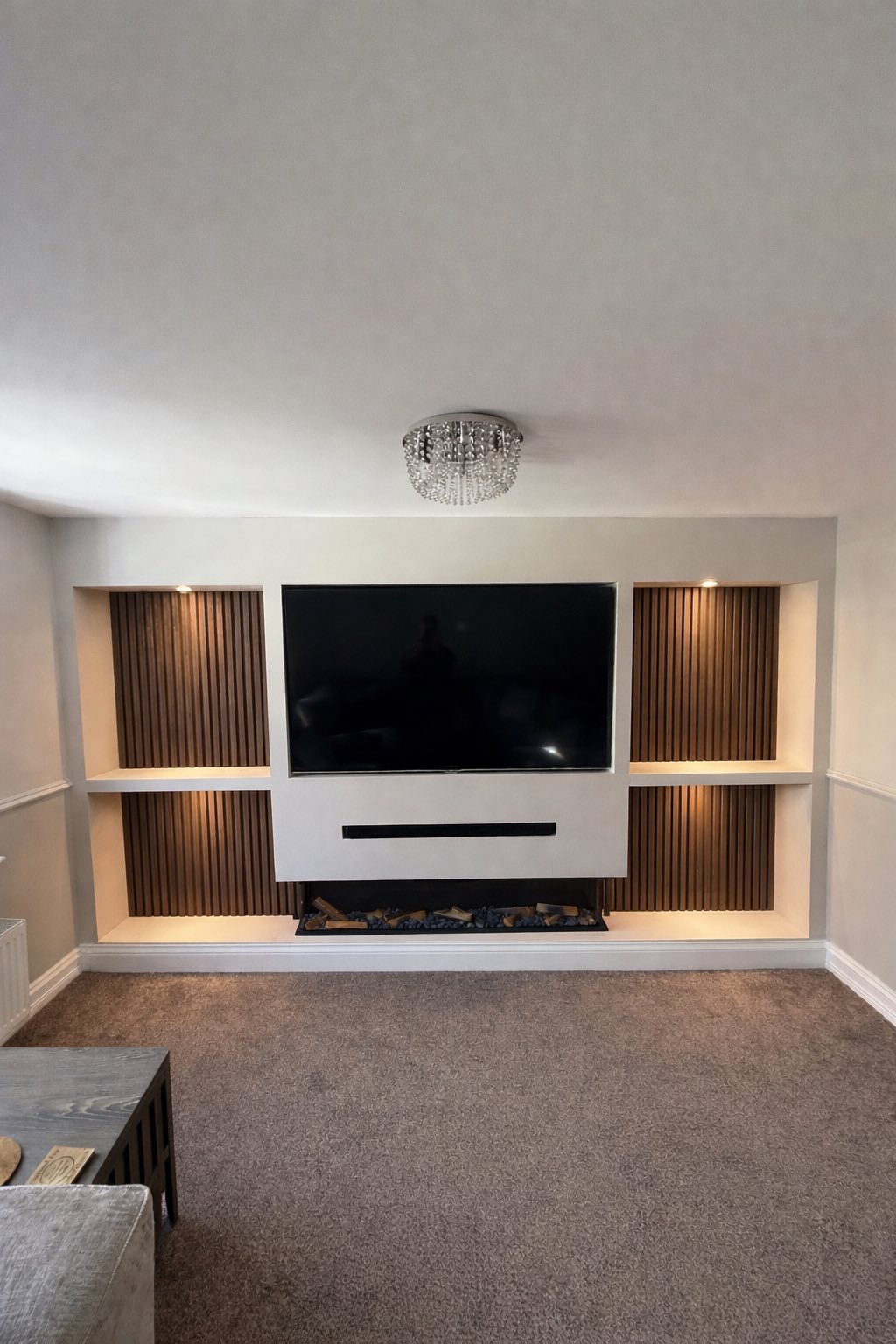 Bespoke media wall with built-in shelving